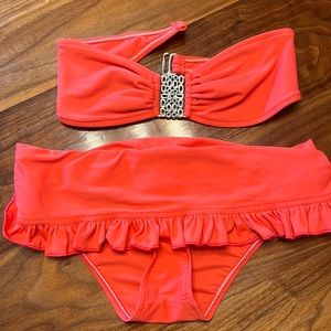 Kushcush bikini, coral color with strapless top (s) and skirted bottoms (m)